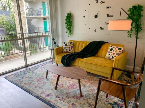 A seating area at Retro Inspired Apt-Great Location Near All The Fun