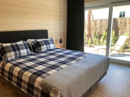 A bed or beds in a room at Casa del Sol Estepona