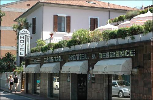 a building on the corner of a street at Hotel Crystal in Portoferraio