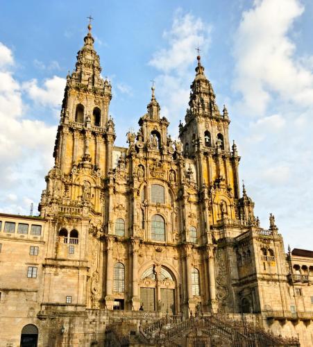an old building with two towers on top of it at Casa Independiente Bella Vista in Moaña