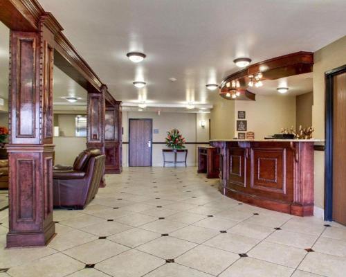 a large room with a large kitchen with a counter at Days Inn by Wyndham Jackson Downtown in Jackson