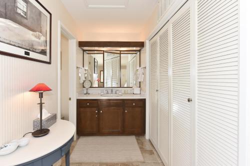 a bathroom with a sink and a mirror at 305 Northgate at Silverado in Napa condo in Napa