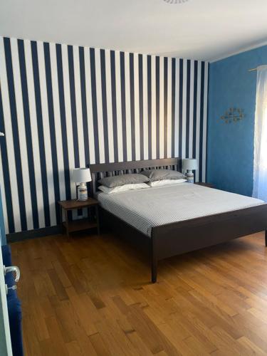 Postel nebo postele na pokoji v ubytování C&E Suites Roma