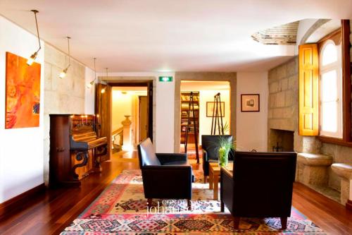 Гостиная зона в Casa Melo Alvim - by Unlock Hotels
