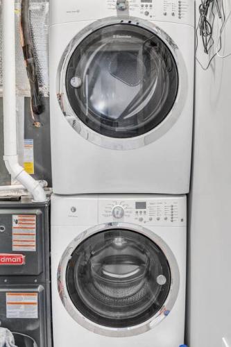 a washer and dryer sitting next to each other at Dave and Busters, Outlets, Convention Center across street w Parking - Sleeps 15 in Atlantic City