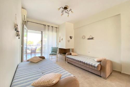 Posteľ alebo postele v izbe v ubytovaní Siviri Luxury Apartment Cleopatra