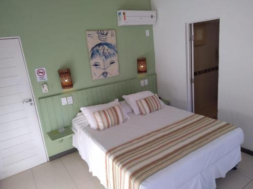 Cama o camas de una habitación en Pousada Tatuapara