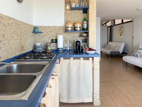 Küche/Küchenzeile in der Unterkunft Giardini Beach loft