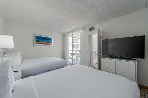 Postel nebo postele na pokoji v ubytování ICONA Diamond Beach
