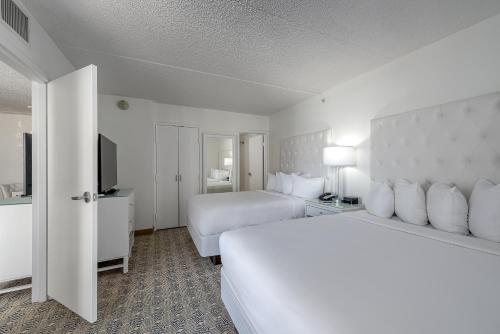Postel nebo postele na pokoji v ubytování ICONA Diamond Beach