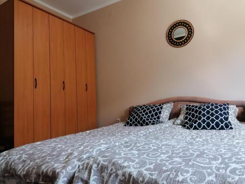 Postel nebo postele na pokoji v ubytování Apartman Lili