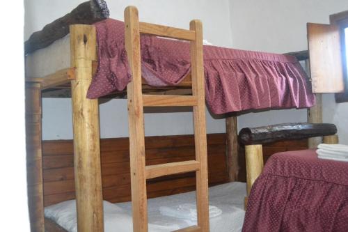 Postelja oz. postelje v sobi nastanitve Cabañas Los Relinchos