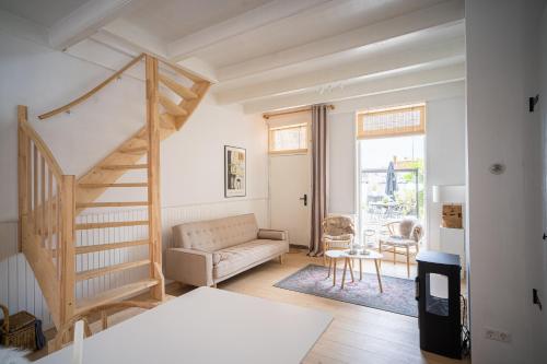 Postel nebo postele na pokoji v ubytování Vakantiehuis New Zeeland