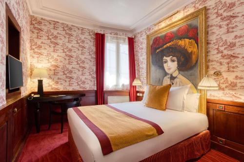a hotel room with a bed and a painting on the wall at Grand Hotel de l'Opera - BW Premier Collection in Toulouse