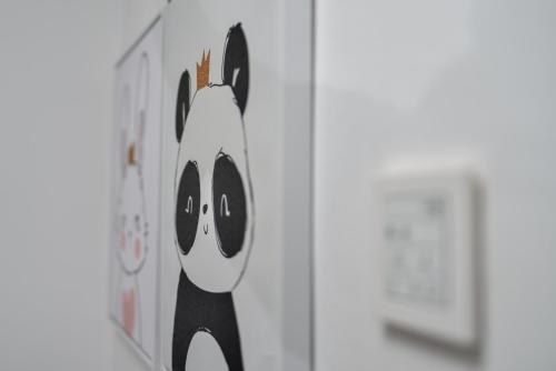 a wall with a picture of a cat on it at Lagom apartment Maribor w free parking & WiFi, tourist TAX included in Maribor