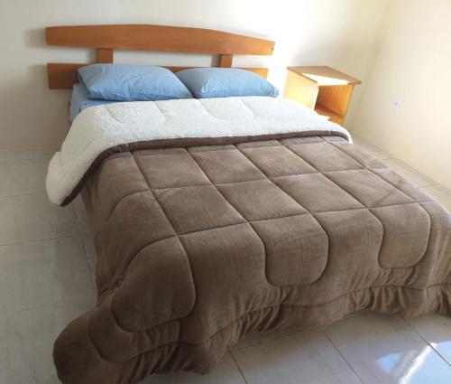Voodi või voodid majutusasutuse Cantinho do Sossego III - Com Lareira toas