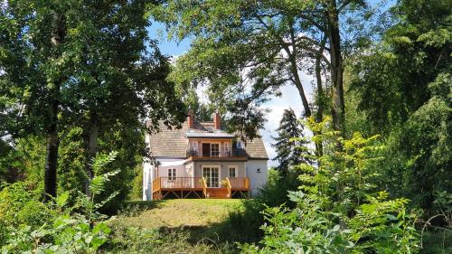 Zahrada ubytování Nasz Dębowiec - dom dla 15 osób, sauna, widok na staw, wielka działka