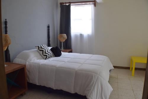 Cama ou camas em um quarto em Finca del Pomar