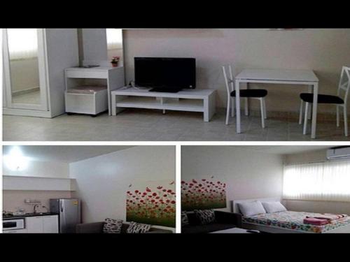 TV a/nebo společenská místnost v ubytování T8 Guest House Don Mueang Challenger triple room
