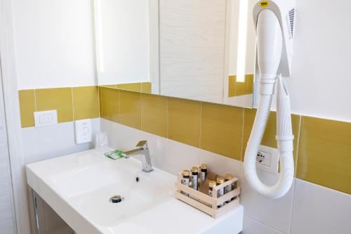 a bathroom with a sink and a shower at Casa Marino in Sorrento
