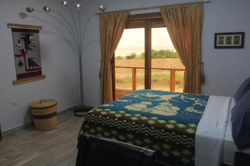 Un pat sau paturi într-o cameră la El Ocaso