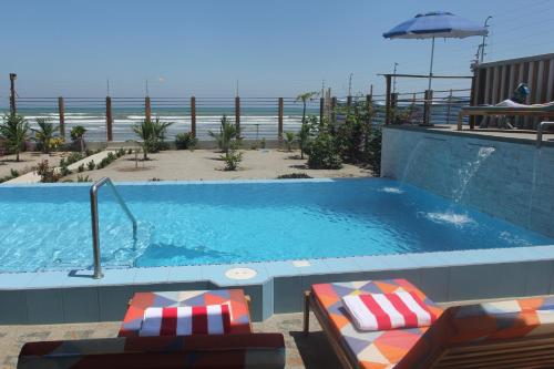 Φωτογραφία από το άλμπουμ του El Ocaso oceanfront apartment σε Canoa