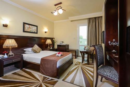 A bed or beds in a room at Mirita Hotel ,10th Of Ramadan