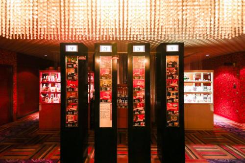 a store with a bunch of refrigerators in a room at ホテル 魔法のリトルパンプキン ザ シークレットガーデン 岡山 -大人専用- in Okayama