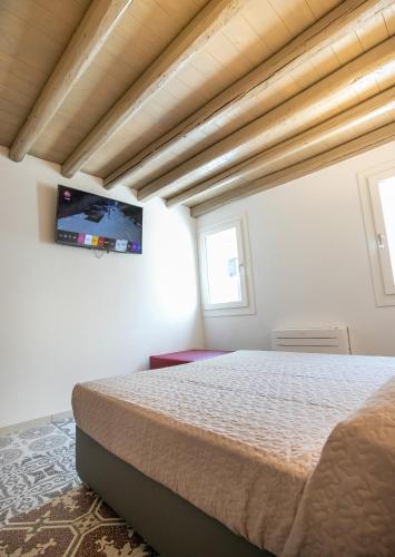 Postel nebo postele na pokoji v ubytování Casa Boscolo Family - Luxury House