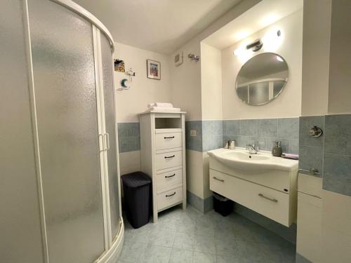 a bathroom with a sink and a shower at TERRAZZA Marina Piccola in Capri