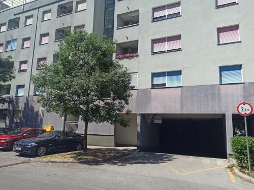ein vor einem Gebäude geparkt in der Unterkunft Zagreb LAKE STAR & Included garage parking place in Zagreb