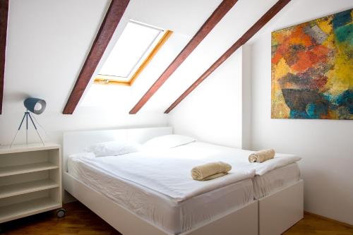 Postel nebo postele na pokoji v ubytování PortHouse Apartments