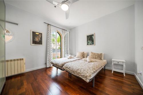 Posteľ alebo postele v izbe v ubytovaní Villa Playa Felostal