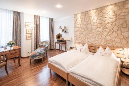 Postel nebo postele na pokoji v ubytování Hotel Roter Turm