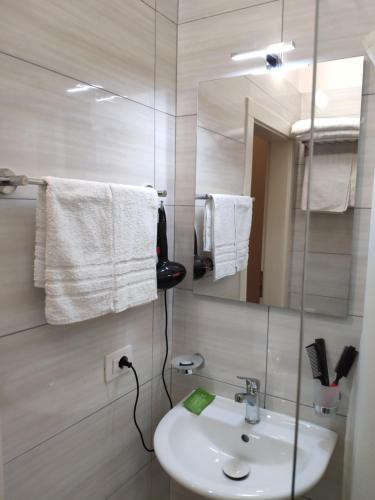 Koupelna v ubytování Hotel TREVA
