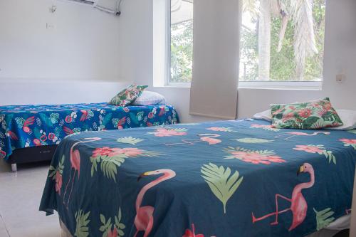 Postel nebo postele na pokoji v ubytování Departamento Bocagrande cerca a playas