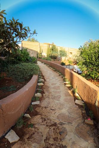Κήπος έξω από το Sultana Farm and Villa