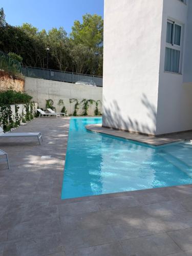 Bazén v ubytovaní CANYAMEL Apt 3A CALA VARQUES 100 mts from Canyamel Beach POOL CHILL-OUT TERRACE WITH AWESOME VIEWS alebo v jeho blízkosti