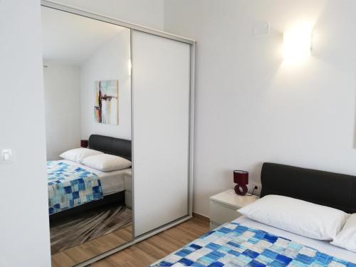 Posteľ alebo postele v izbe v ubytovaní Apartment Zvone, Sukošan-brand new apartments