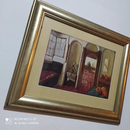 un quadro incorniciato di una stanza con frutta di little&sweet a Sarajevo