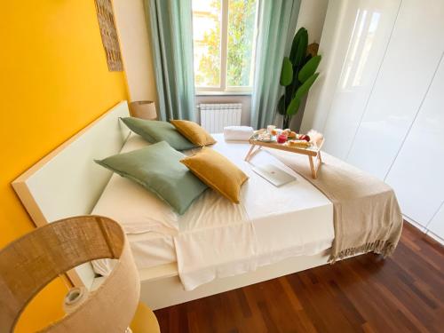 Katil atau katil-katil dalam bilik di GIALLOMANGO Apt in Lucca