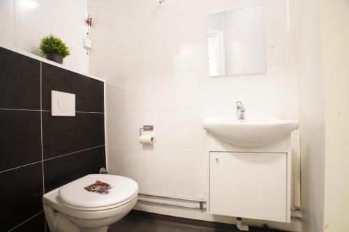 Et badeværelse på Hage Rooms