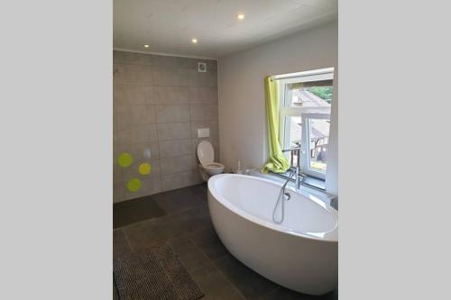 Koupelna v ubytování Maison située à 1km du circuit de Francorchamps