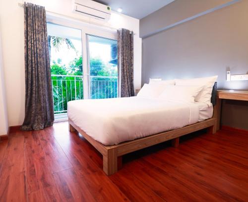 Katil atau katil-katil dalam bilik di Transit Suites by GrandWest