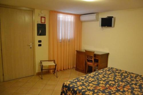 Lova arba lovos apgyvendinimo įstaigoje Hotel La Locanda Del Borgo