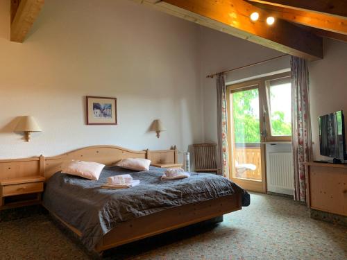 Säng eller sängar i ett rum på Gasthof Sonnenheim
