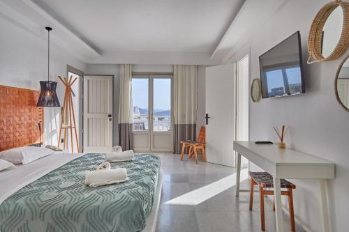 Posteľ alebo postele v izbe v ubytovaní Sunset View Hotel