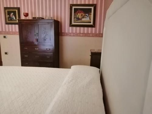 Ένα ή περισσότερα κρεβάτια σε δωμάτιο στο Solimena House