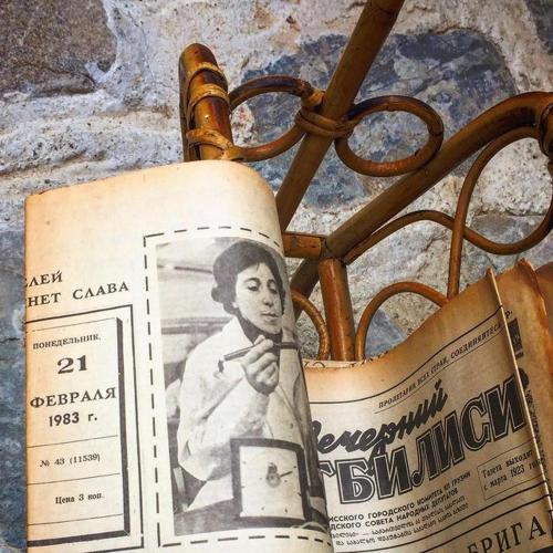 a book with a picture of a man on it at Dzveli Galavani -Old Wall in Tʼelavi
