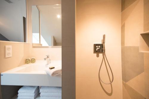 Koupelna v ubytování Logis Villa C Hôtel